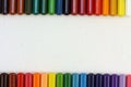 Rows of colored pencils, background