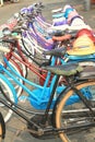 colorful bicycles and hats for rent Royalty Free Stock Photo