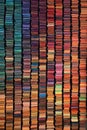 rows of colorful books forming a repeating pattern Royalty Free Stock Photo