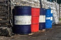 rows of colorful iron barrels for storing fuel and oil Royalty Free Stock Photo