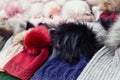 Rows of colorful wool hats