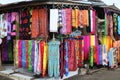 Rows of colourful silk scarfs hanging at a market stall in Indonesia Royalty Free Stock Photo