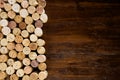 Rows of corks on a wooden background Royalty Free Stock Photo