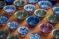 Rows of cups with traditional uzbekistan ornament on a street ma Royalty Free Stock Photo