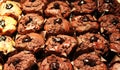 Rows of dark brown chocolate muffins