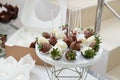 Rows of delicious desserts in beautiful compositions. Sweets on the banquet table - a photo taken during catering