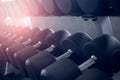 Rows of dumbbell in the gym, sport and health, weight training equipment concept