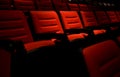Rows of empty cinema or theater red seats. Royalty Free Stock Photo