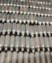 Rows of empty nitrous oxide & x28;laughing gas& x29; cannisters / cream puff chargers: used as a legal high Royalty Free Stock Photo