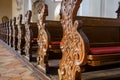 Rows of empty pews inside church or cathedral Royalty Free Stock Photo