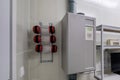 Rows of empty pneumatic tubes of transfer system station in modern clinic, designed for fast operational transfer of analyzes,