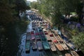 Rows of empty punts on the River Cherwell in Oxford, Oxfordshire in the United Kingdom