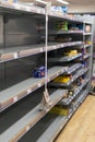 Rows of empty shelves in Tesco supermarket store in Bethnal Green, East London.