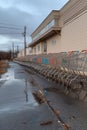 rows of empty shopping carts outside supermarket entrance