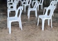 Rows of Empty White Plastic Chairs Royalty Free Stock Photo