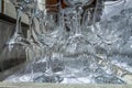 Rows of empty wine glasses close up. Glass goblets on the white table.