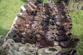 Rows of ex military army shoes boots for sale secondhand