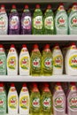 Rows of Faiy dishwashing liquid on the shelves in the store. Vertical. Moscow, Russia, 03-04-2021