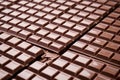 rows of finished chocolate bars perfectly aligned