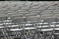 Rows of folding white chairs Royalty Free Stock Photo