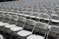 Rows of folding white chairs Royalty Free Stock Photo