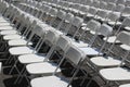 Rows of folding white chairs Royalty Free Stock Photo