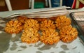 Freshly Fried Flower Shaped Thai Traditional Dessert Called Kanom Dokchok for Sale at Local Stall