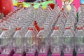 Rows of glass bottles for a carnival ring toss game Royalty Free Stock Photo