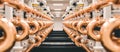 Rows of gleaming copper pipes and valves fill a modern industrial facility, showcasing precision engineering and complex systems Royalty Free Stock Photo