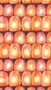 Rows of glowing orange candles Royalty Free Stock Photo