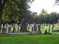 An old grassed church grave yard Royalty Free Stock Photo