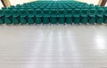 rows of green chairs in the auditorium of a rural cinema or theater. Royalty Free Stock Photo