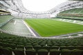 Rows of green seats in an empty stadium Aviva