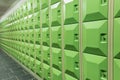 Rows of green student lockers in school hall