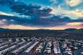 Rows of homes in Green Valley, Arizona with vibrant clouds