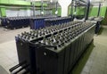 Rows of industrial storage batteries.A room used for backup or uninterruptible power supply.