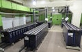 Rows of industrial storage batteries.A room used for backup or uninterruptible power supply.