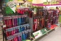 Rows of leads and leashes in a pet store.