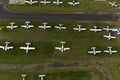 Rows Of light Planes At A Regional Airport Awaiting Next Scheduled Flight