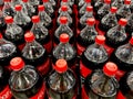 Rows of 2 liter Coke bottles in trays Royalty Free Stock Photo