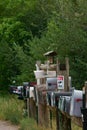 Rows of Mail Boxes sits becide a Mountian Pass Road Royalty Free Stock Photo