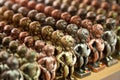 Rows of Manneken Pis Metallic Replicas in different Colors Royalty Free Stock Photo