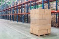 Rows of material boxes or product boxes in warehouse area Royalty Free Stock Photo