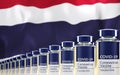 Rows of multiple Covid-19 vaccine vials with flag of Thailand in background. Mass production and inoculation concept. 3d rendering Royalty Free Stock Photo