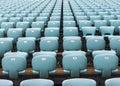 The rows of numbered turquoise chairs stretching into the distance