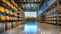 Rows of Oak Barrels in Spacious, Light-Filled, Industrial Style Distillery or Warehouse Royalty Free Stock Photo