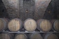 Rows of oak tuns in the old wine cellar Royalty Free Stock Photo