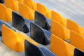 Rows of old plastic colorful seats at a stadium Royalty Free Stock Photo