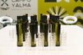 Green olive oil bottles at the 10th World Olive Oil Exhibition 2023 at IFEMA, Madrid Spain