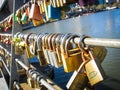 Rows of padlocks attached to the rails of Southbank footbridge